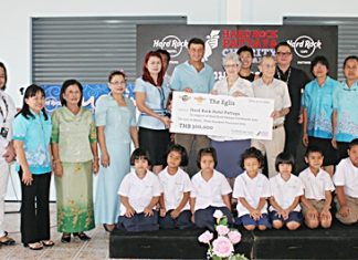 Members of the Eglis family present a 300,000 baht donation to sponsor the project.